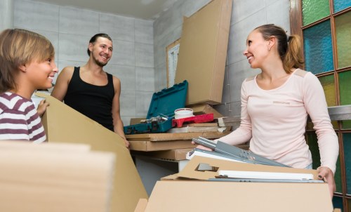 Student removals team loading boxes in Brent