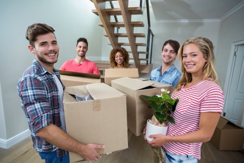 Commercial relocation planning in Brent with office equipment and moving boxes