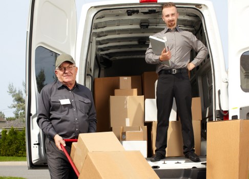 Professional removal team handling belongings in Brent