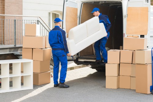 Residential moving day in Brent with packed boxes and furniture ready for transport