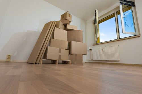 Office movers transporting desks and sensitive materials in Brent