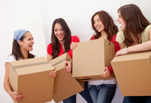 Packed household boxes ready for house removals in Brent