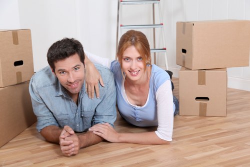 Loading furniture into a removals van in Brent
