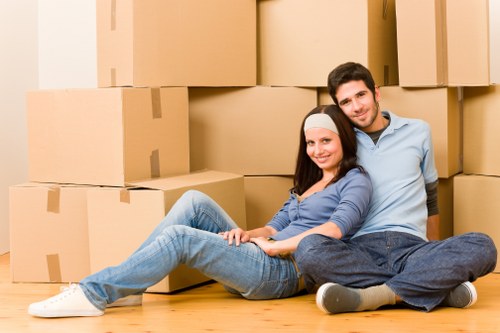 Packed boxes and furniture ready for transport during a Brent move