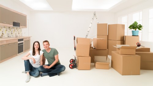 Prepared boxes and furniture ready for a house move in Brent