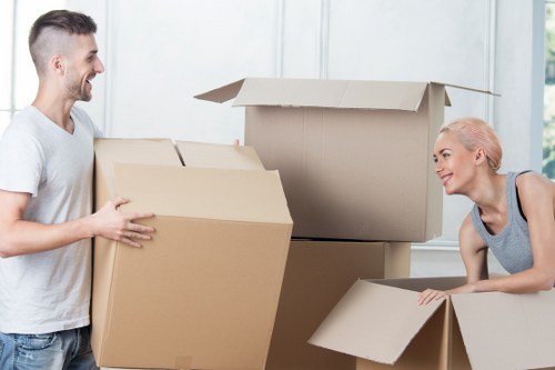 A removals team transporting furniture during same day removals in Brent