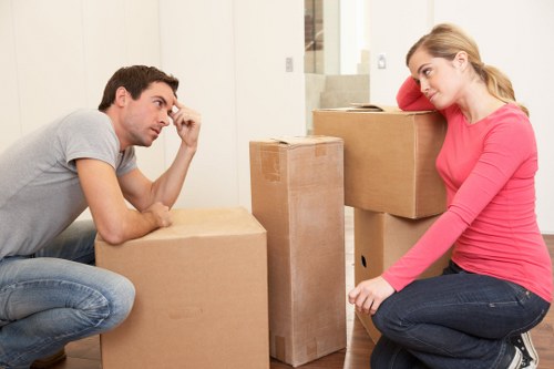 Professional movers handling a flat relocation in Brent