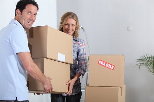 Moving team loading items into a removal van in Brent